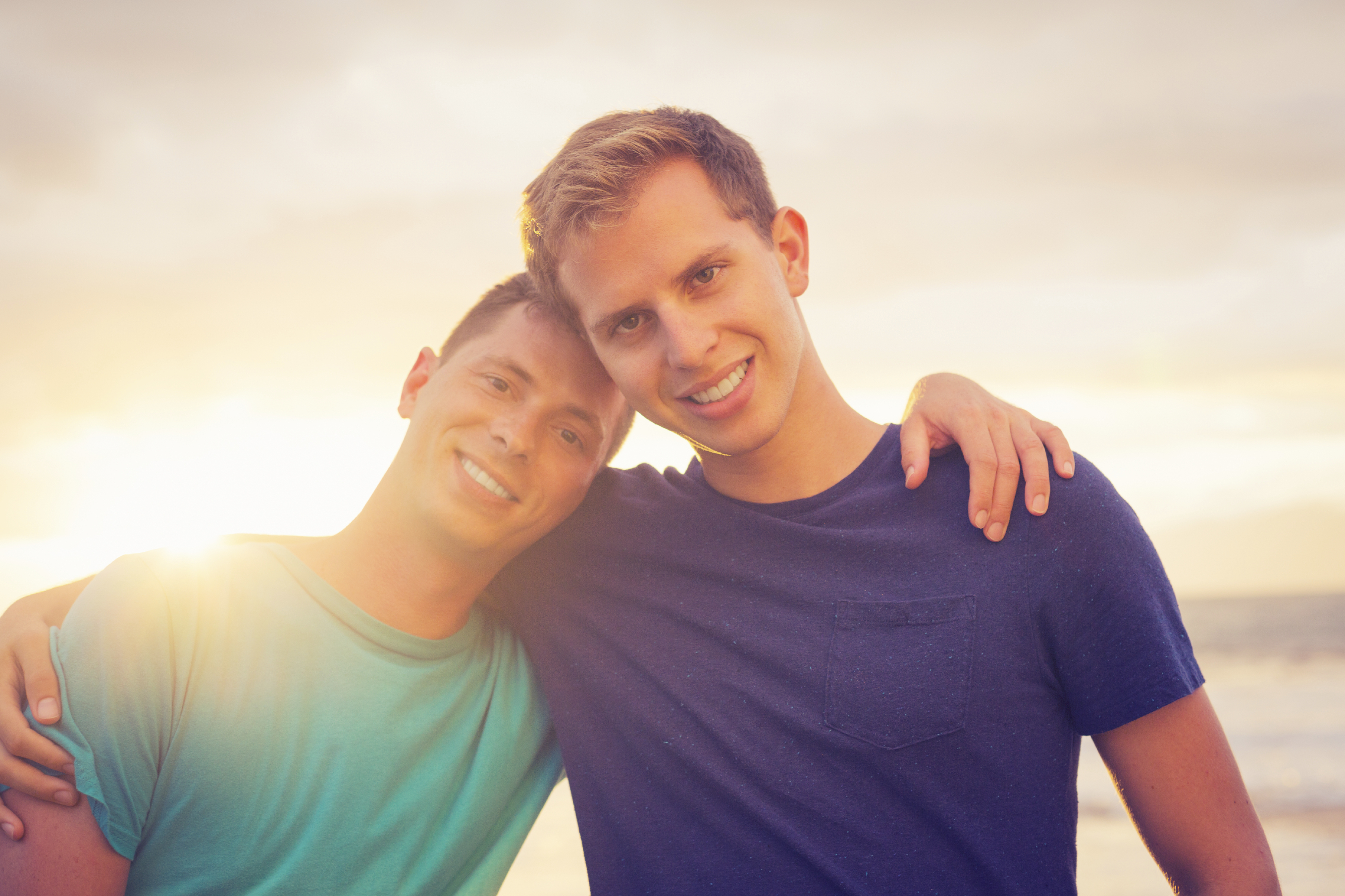 Gay couple and sunset