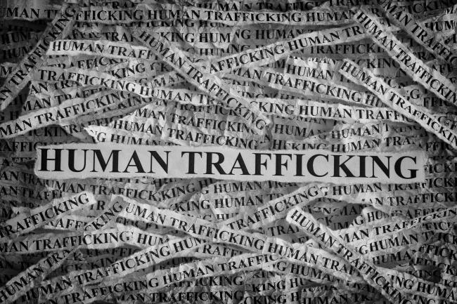 cut out paper that says Human Trafficking